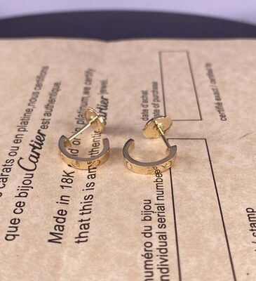 Los pendientes de oro amarillo de 18 Ct.