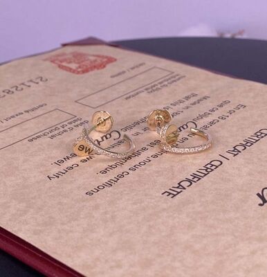 Los pendientes de oro puro de Cartier de 18 quilates Los pendientes de oro con diamantes de 0,51 quilates