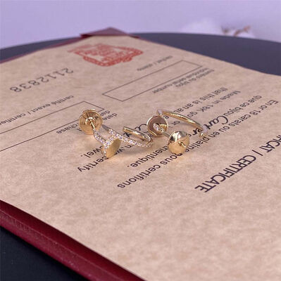 Los pendientes de oro puro de Cartier de 18 quilates Los pendientes de oro con diamantes de 0,51 quilates