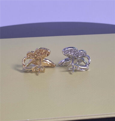 Oro amarillo puro de 18 caratos Dos pendientes de oro mariposa Zafiro y diamantes pendientes de 0,99 quilates